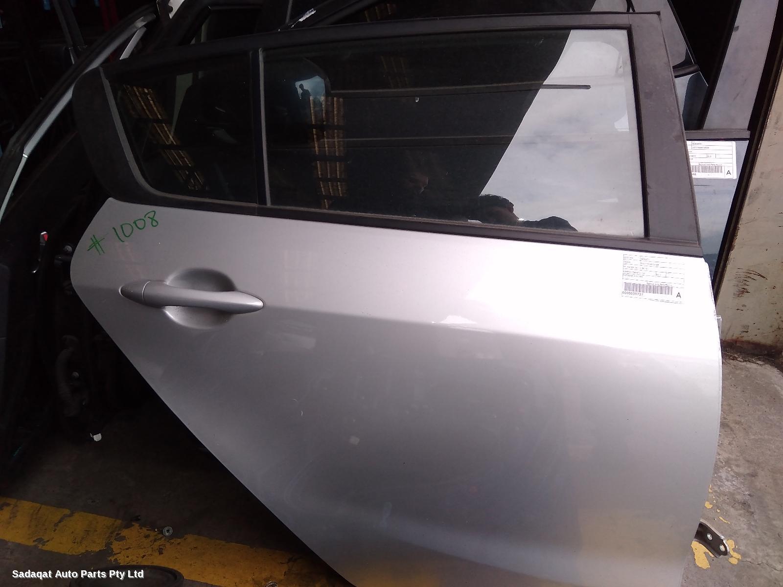 Kia Cerato Right_rear_door_sliding