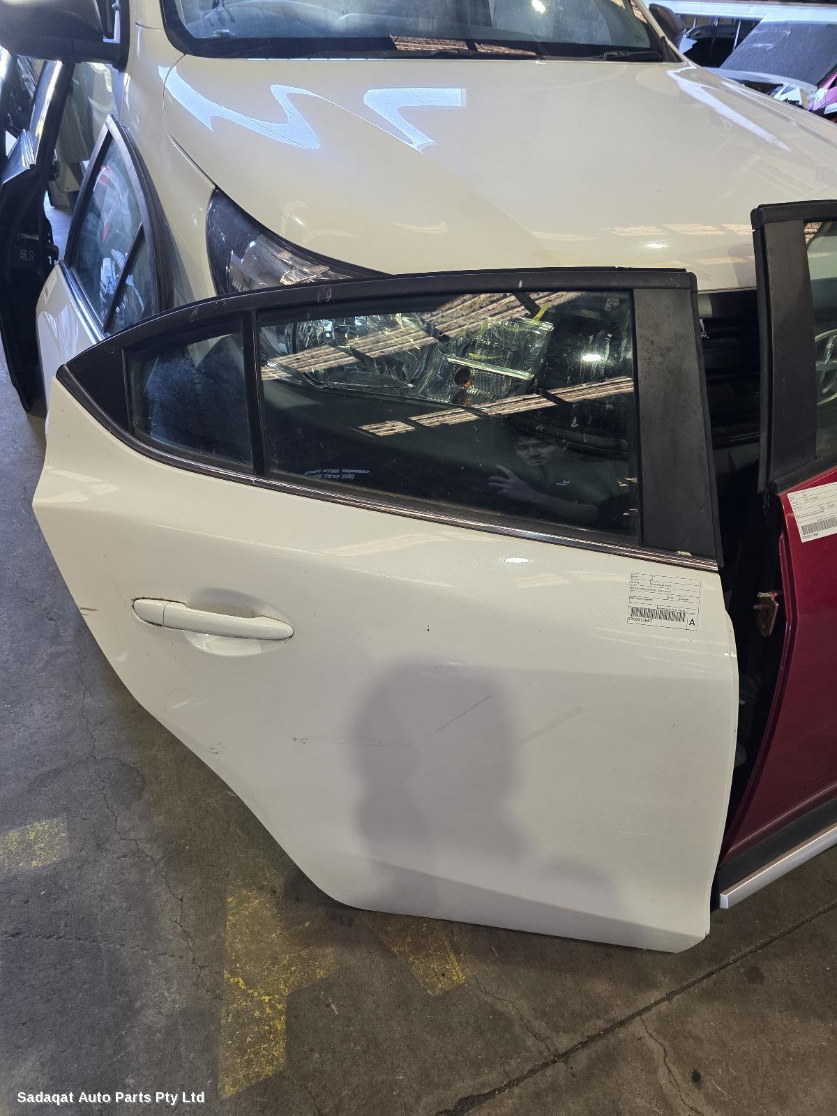 Mazda 3 Right_rear_door_sliding